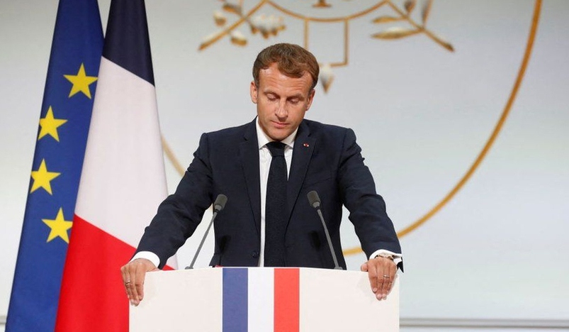 Macron switches to using navy blue on Frances flag